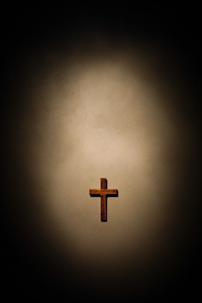 Invitation with a vision - wooden cross with light and darkness